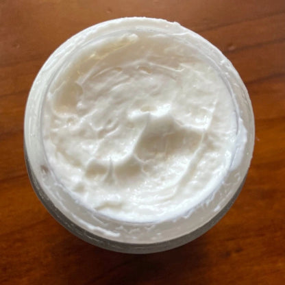 Close-up of shaving cream in a jar